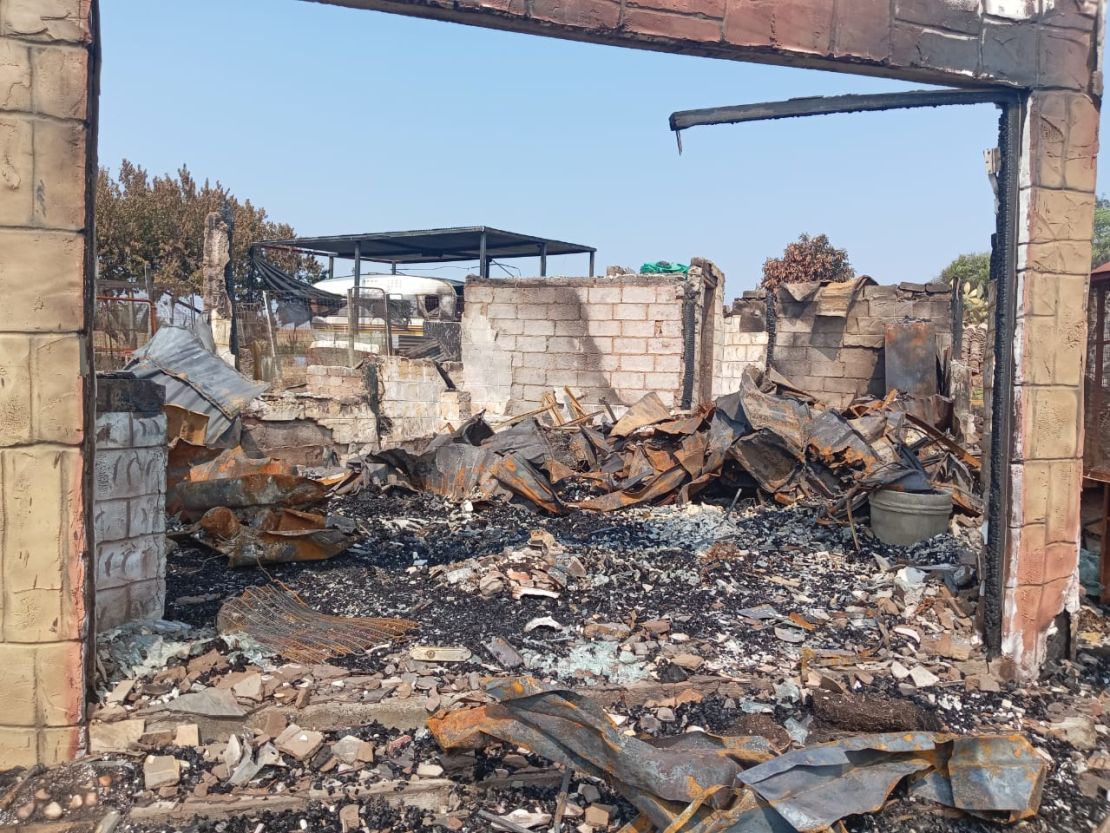 Adriaan Vos' farmhouse in South Africa's Gauteng province was set ablaze by his attackers.