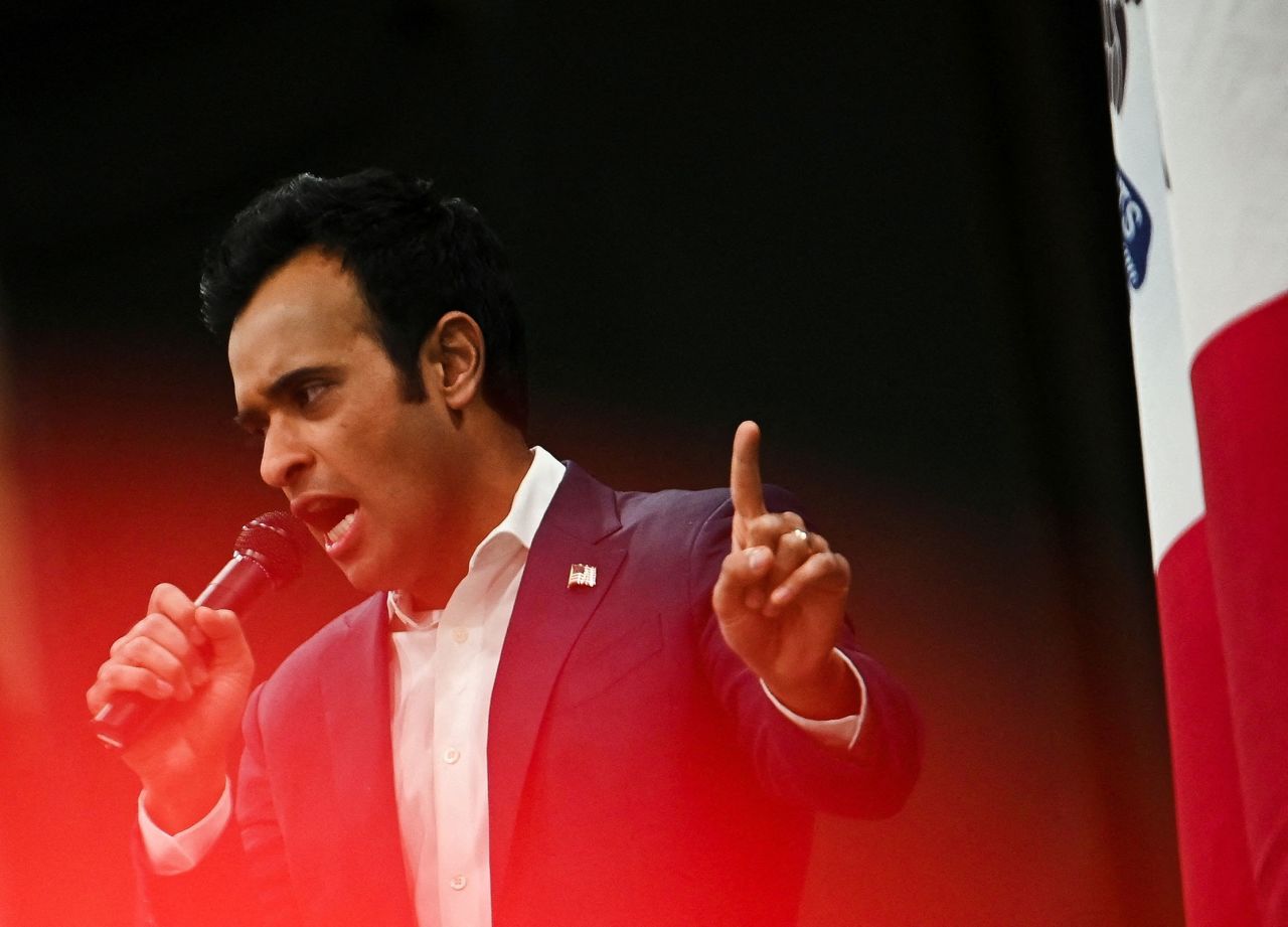 Vivek Ramaswamy speaks as he visits a caucus site at Horizon Event Center in Clive, Iowa, on Monday.