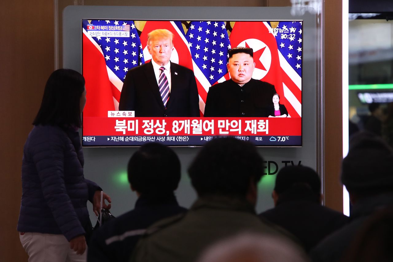 South Korean watch a screen reporting the Trump and Kim summit.