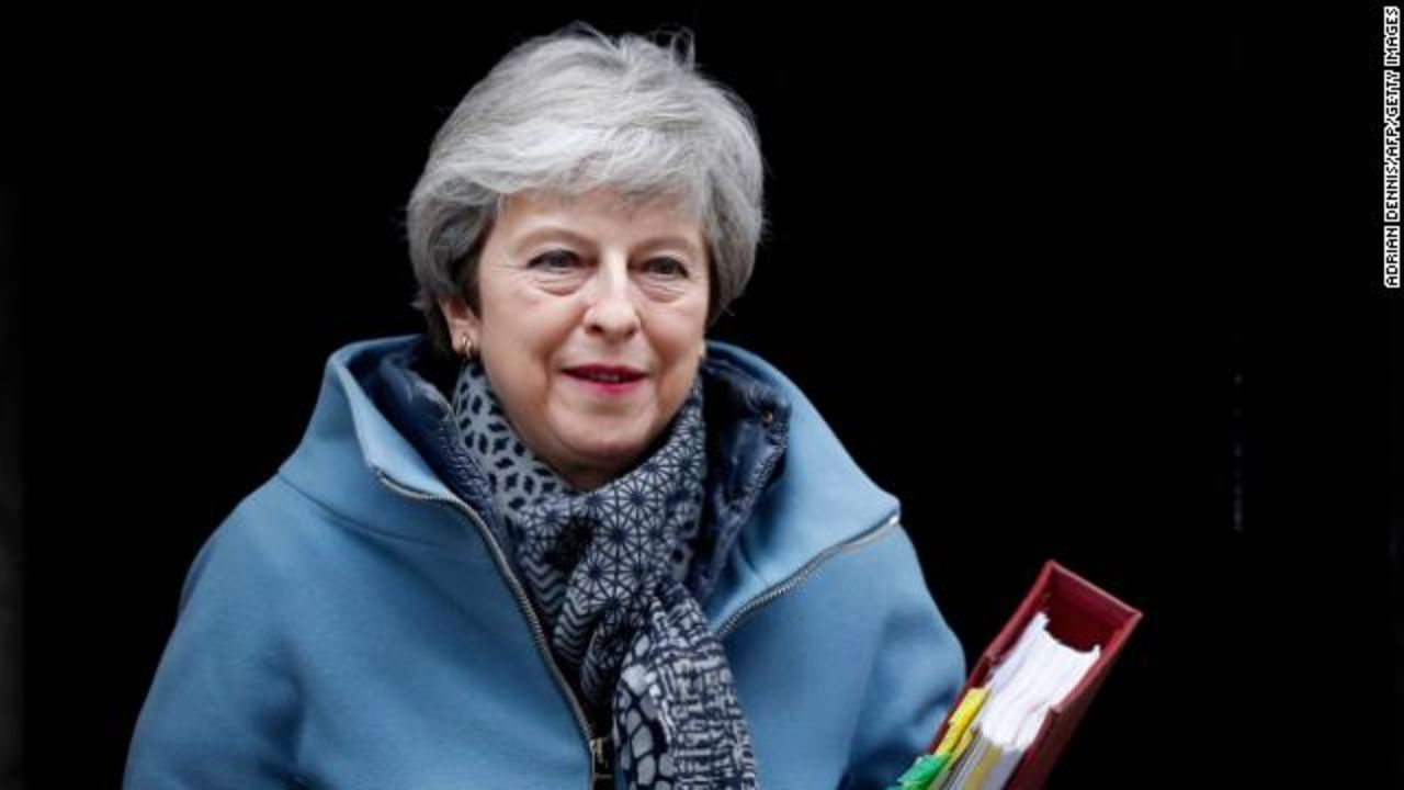 Theresa May leaves 10 Downing Street for Prime Minister's Questions in the House of Commons on Wednesday.