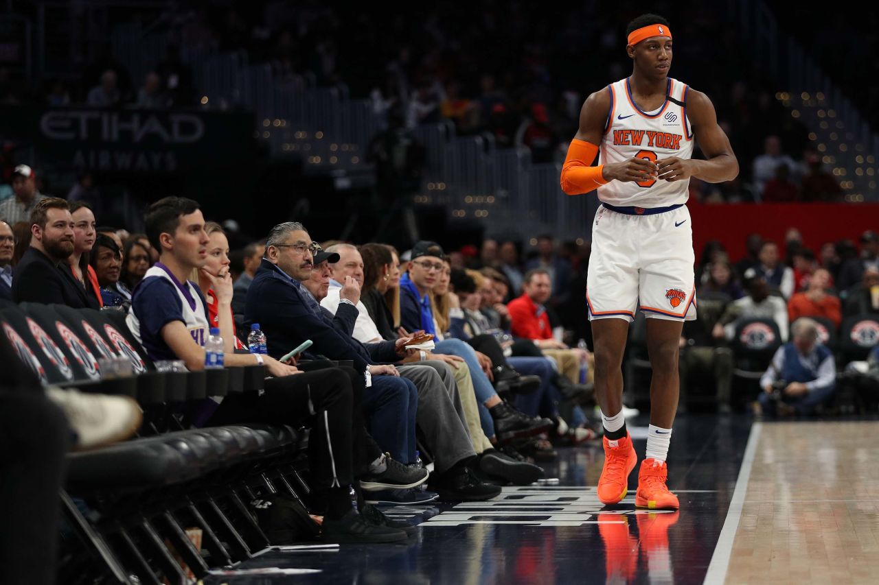 Spectators look on as RJ Barrett of the New York Knicks walks on court during a game against the Washington Wizards, at Capital One Arena in Washington, DC on Tuesday.