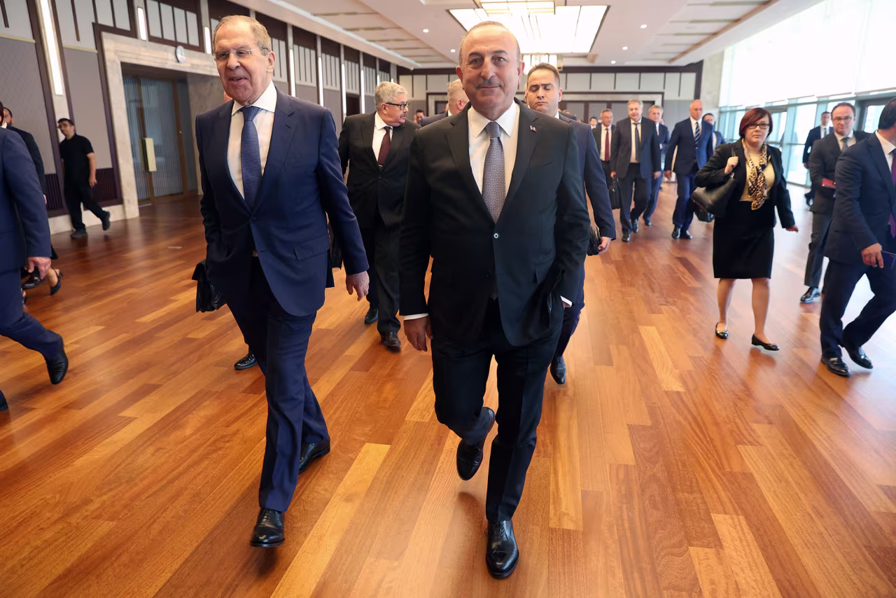 Russian Foreign Minister Sergei Lavrov, left, and Turkish Foreign Minister Mevlut Cavusoglu, right, speak after a news conference in Ankara, on June 8.