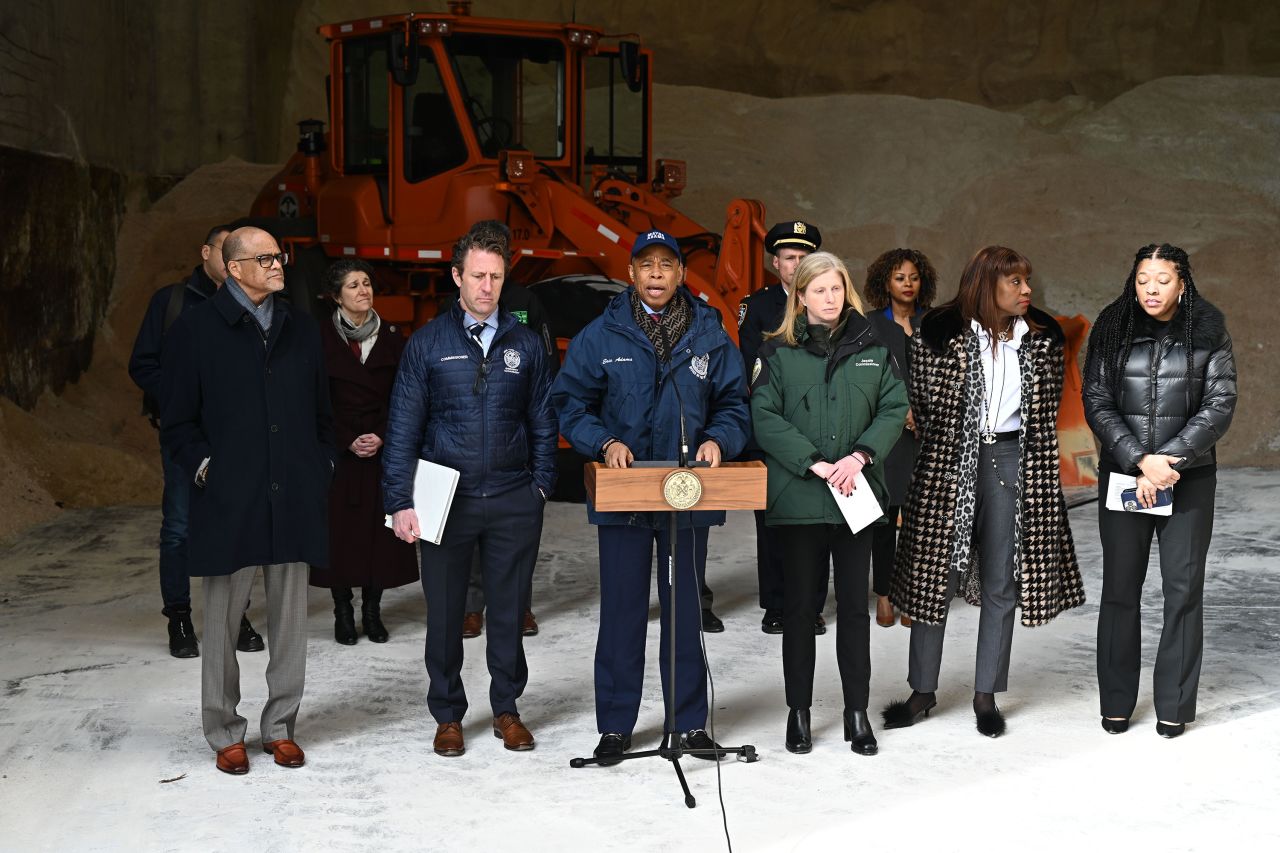 New York City Mayor Eric Adams and senior administration officials brief the media on preparations for winter weather at a salt shed in New York on February 12.