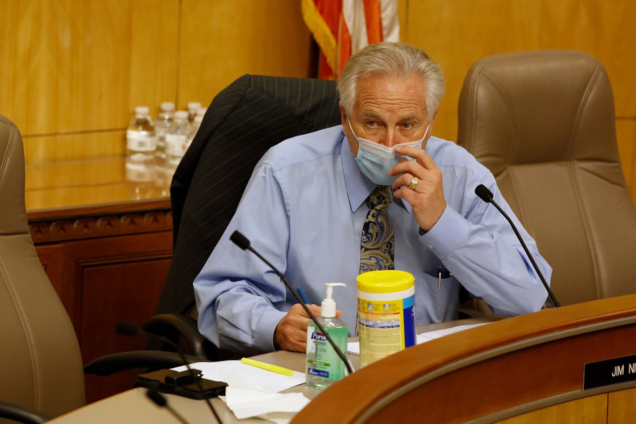 California Sen. Jim Nielsen, adjusts his face mask during a hearing of the special subcommittee on Covid-19, at the Capitol in Sacramento, California on April 16.