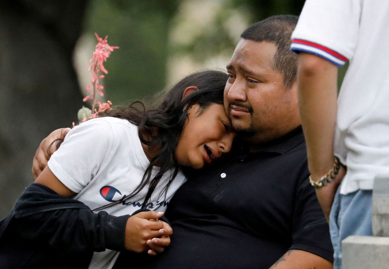 People gather outside the local civic center where students were transported after the school shooting in Uvalde, Texas, on Tuesday.