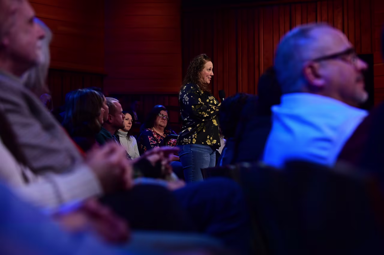 An audience member asks a question during the town hall.