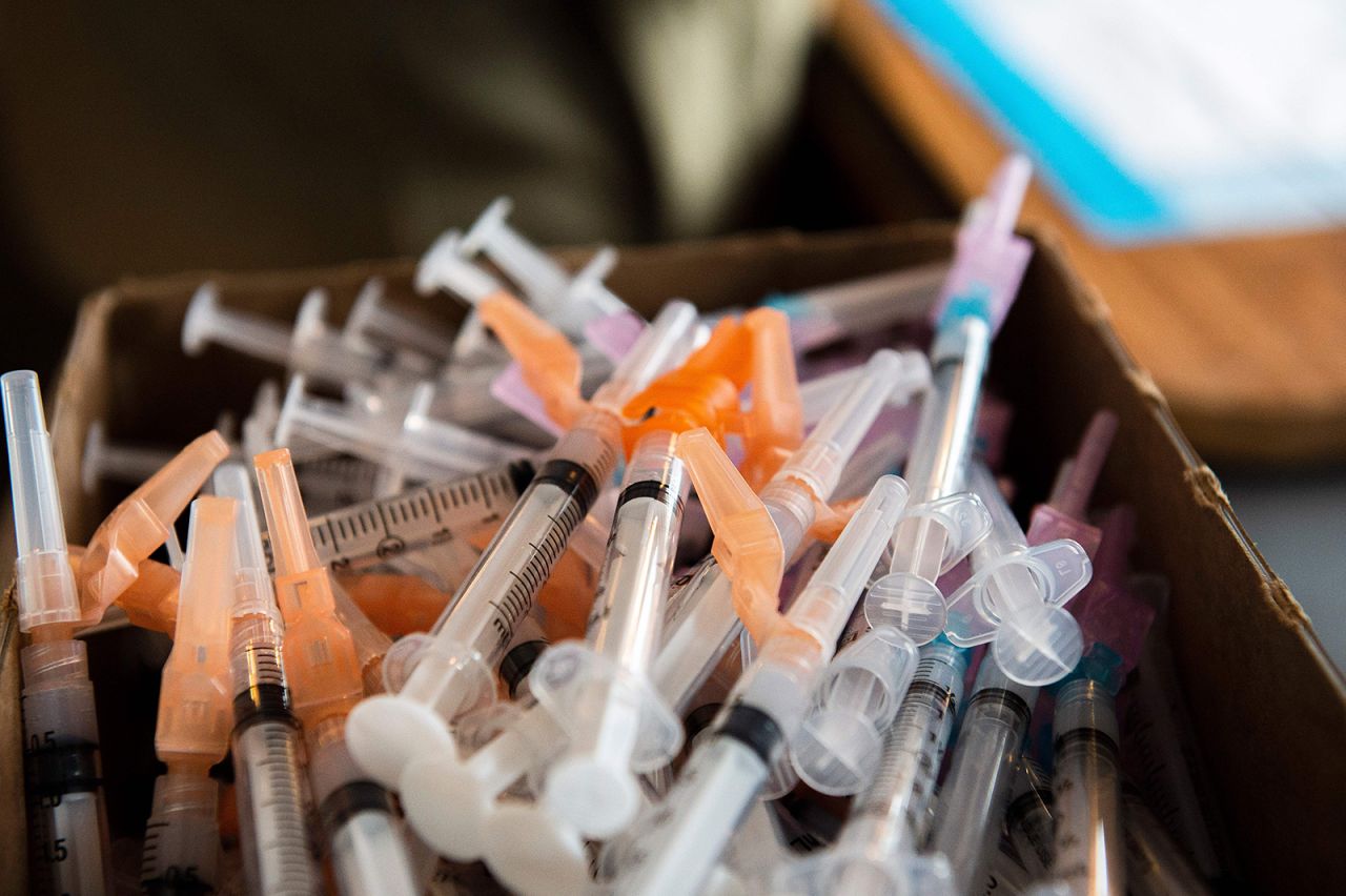 Empty sit in a box waiting to be filed with the Moderna vaccine at a vaccination center in Londonderry, New Hampshire on February 4.