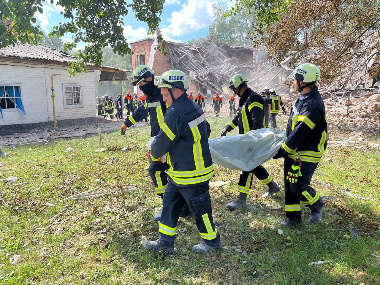 Rescuers work at the site of a Russian drone strike in Romny in?Sumy?region, Ukraine, on August 23.