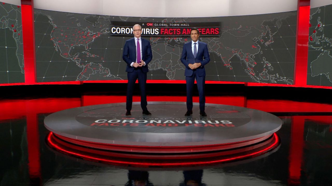 Anderson Cooper and Dr. Sanjay Gupta.