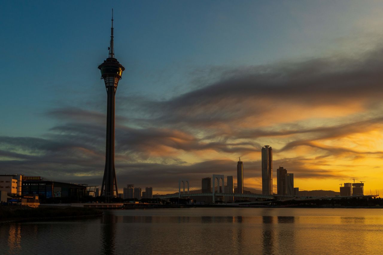 The Macau Tower (left) and the skyline is seen during sunset in Macau on December 18, 2019.?