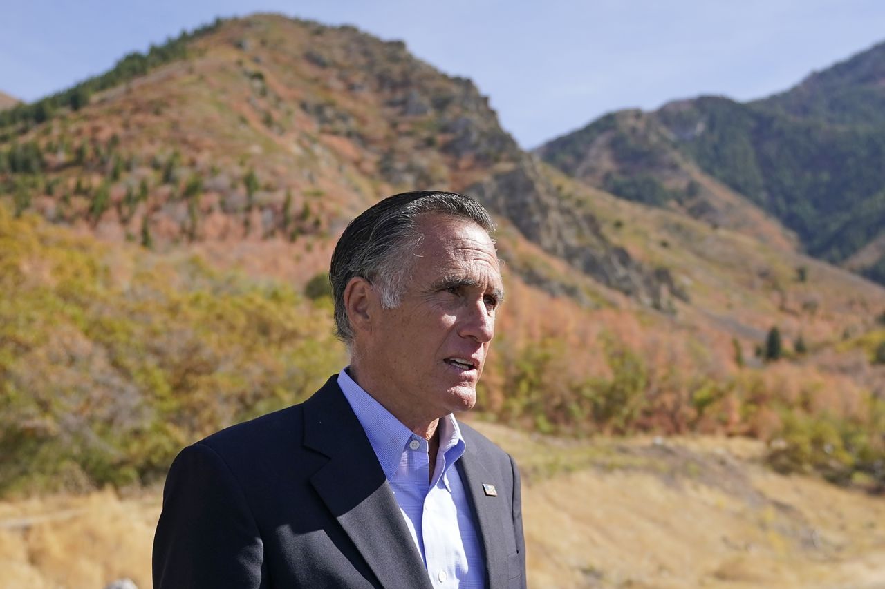 Sen. Mitt Romney, R-Utah, speaks to reporters following a news conference Thursday, October 15, near Neffs Canyon in Salt Lake City.