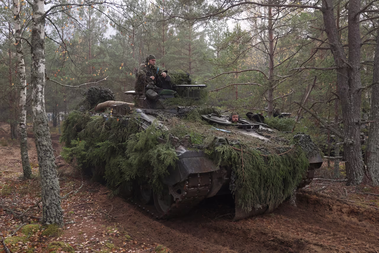 A Marder infantry fighting vehicle of the Bundeswehr, the German armed forces, participates in the NATO Iron Wolf military exercises on October 26, in Pabrade, Lithuania. 