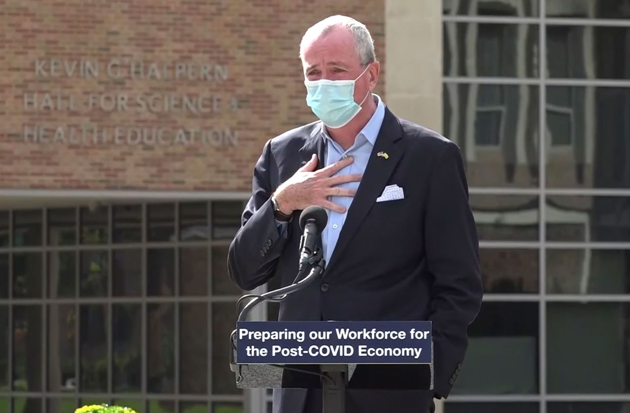 Gov. Phil Murphy speaks at an event on October 21 in Blackwood, New Jersey. He told attendees that he must leave the event after just finding out that he'd been in contact with someone who had tested positive for Covid-19.