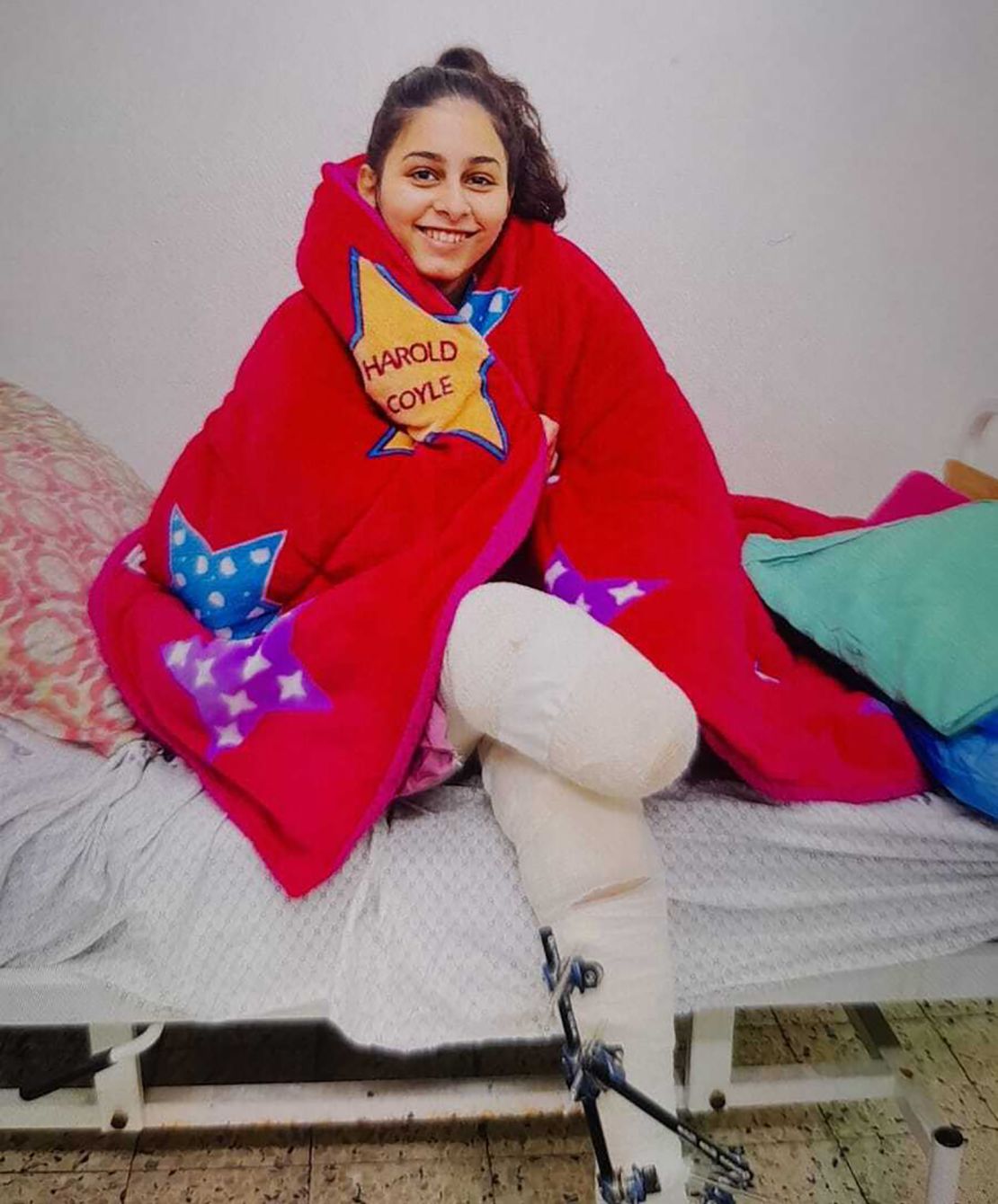 Ahed Bseiso, 17, is seen weeks after her leg was amputated without anesthesia.