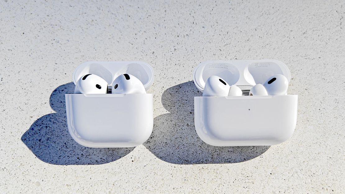 Airpods 4 and Airpods Pro 2 with cases open.