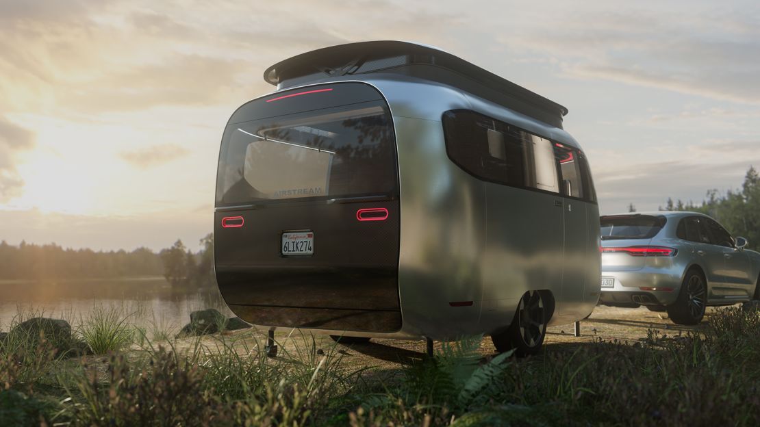 A rendering of the Airstream Studio F. A. Porsche Concept Travel Trailer. Designed by Airstream and the F.A. Porsch design studio, it features optimized aerodynamics and a pop-up top for more space when camping.