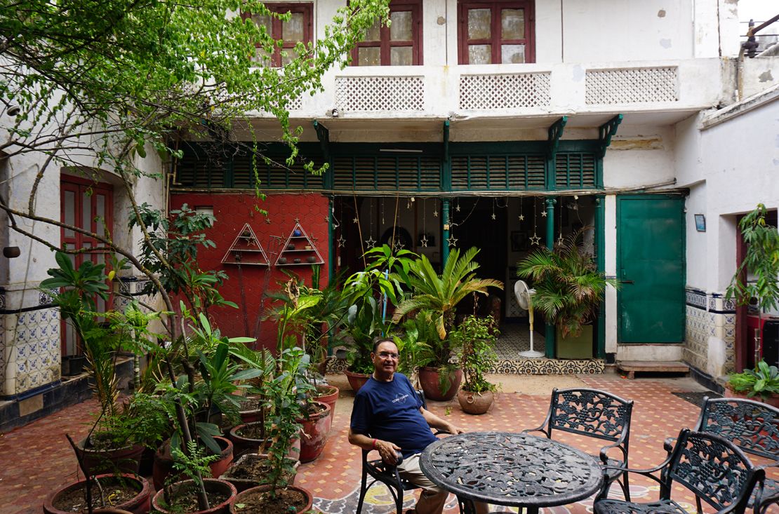 Ajay Pershad sits in the courtyard of his grand 120-room ancestral haveli (traditional house).