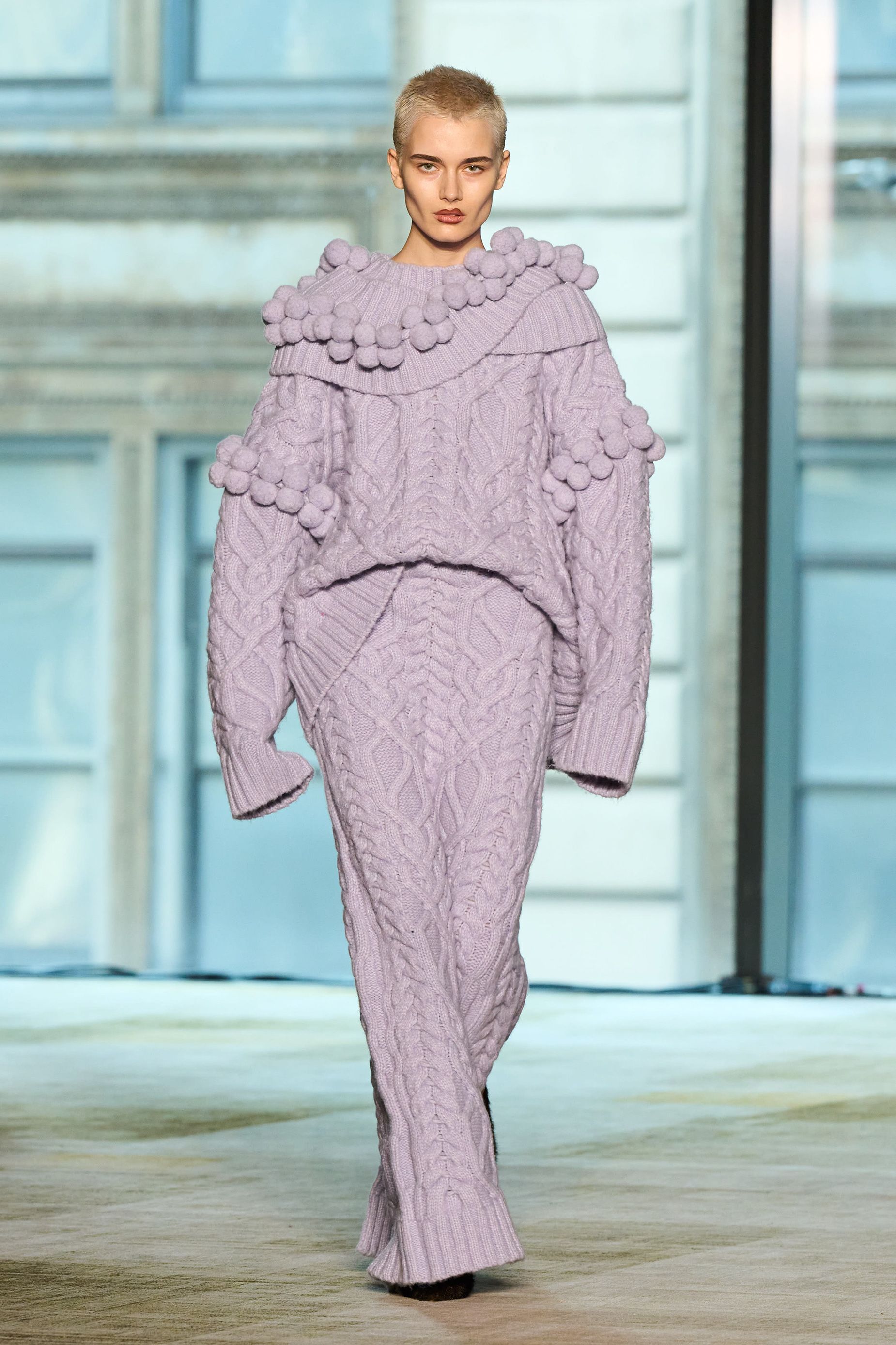 Intricate, chunky knits and pom-pom detailing punctuated the Aknvas collection.
