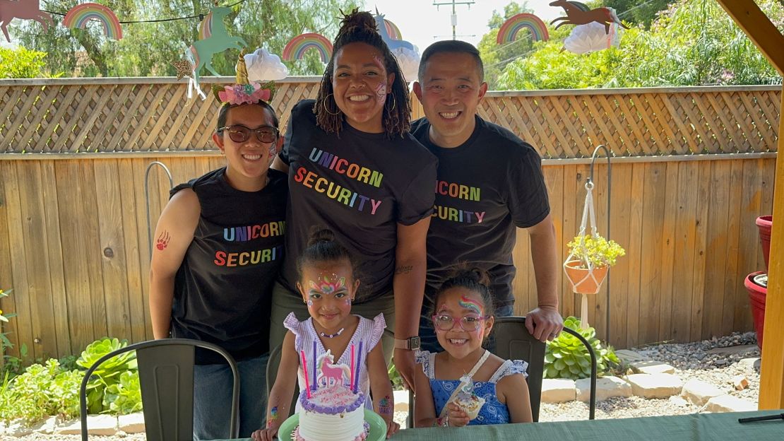 Angela Lee, center, poses with her husband Paul and their family, 14-year-old Lizzie, 4-year-old Ayla and 5-year-old Justise. Lee says she makes a point of teaching her daughters to embrace their full identities and steers away from using fractions to describe their heritage.