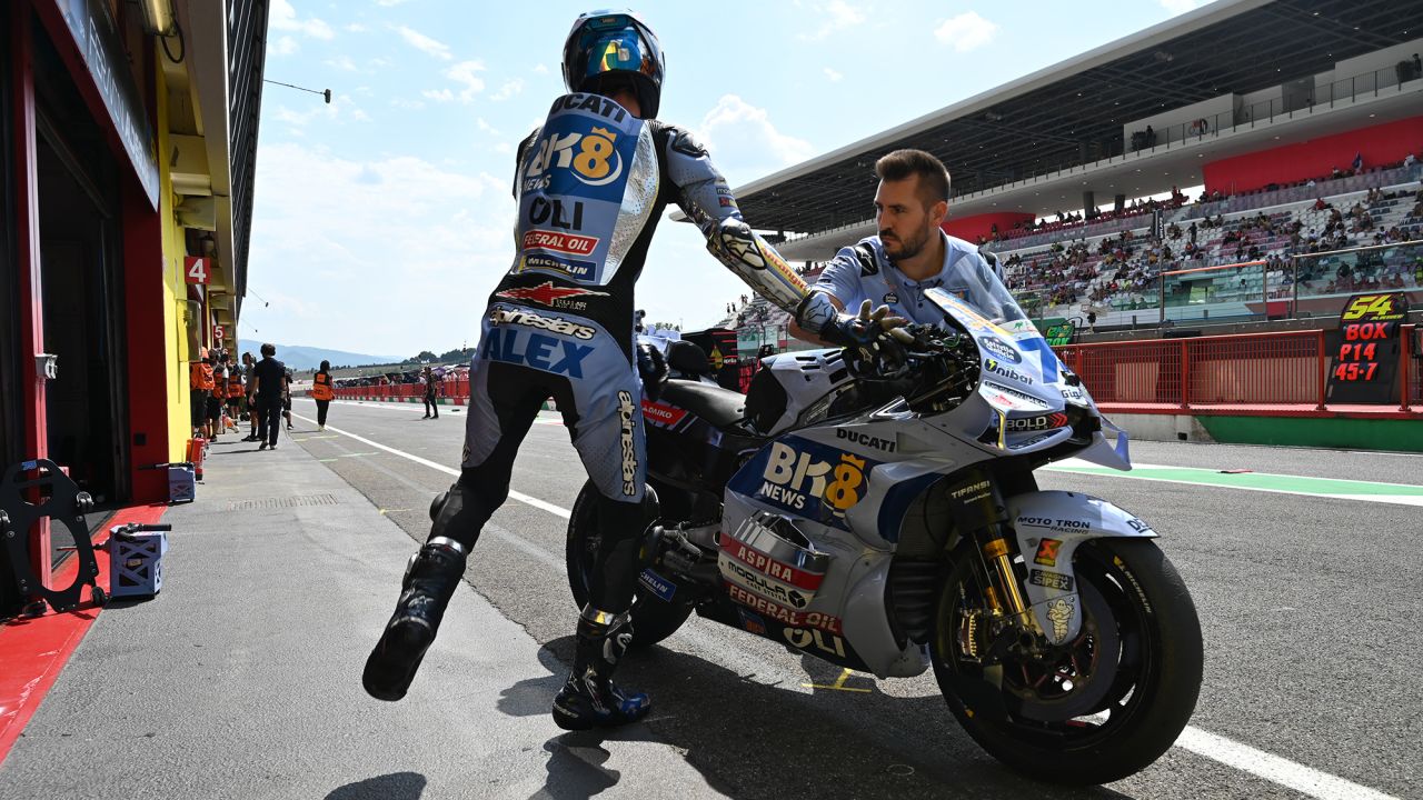Alex-Marquez-jumps-off-his-Ducati-during-MotoGP-qualifying-at-Mugello.jpg