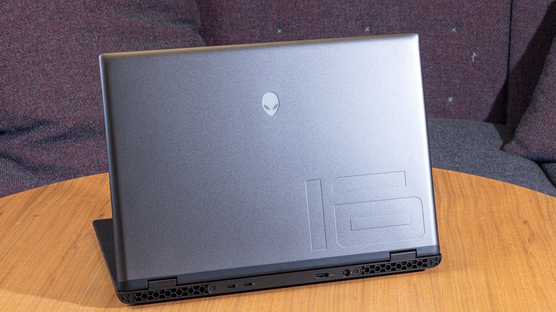 Alienware m16 R2 as seen from behind with open lid, showing Alienware logo and the debossed numeral “16”