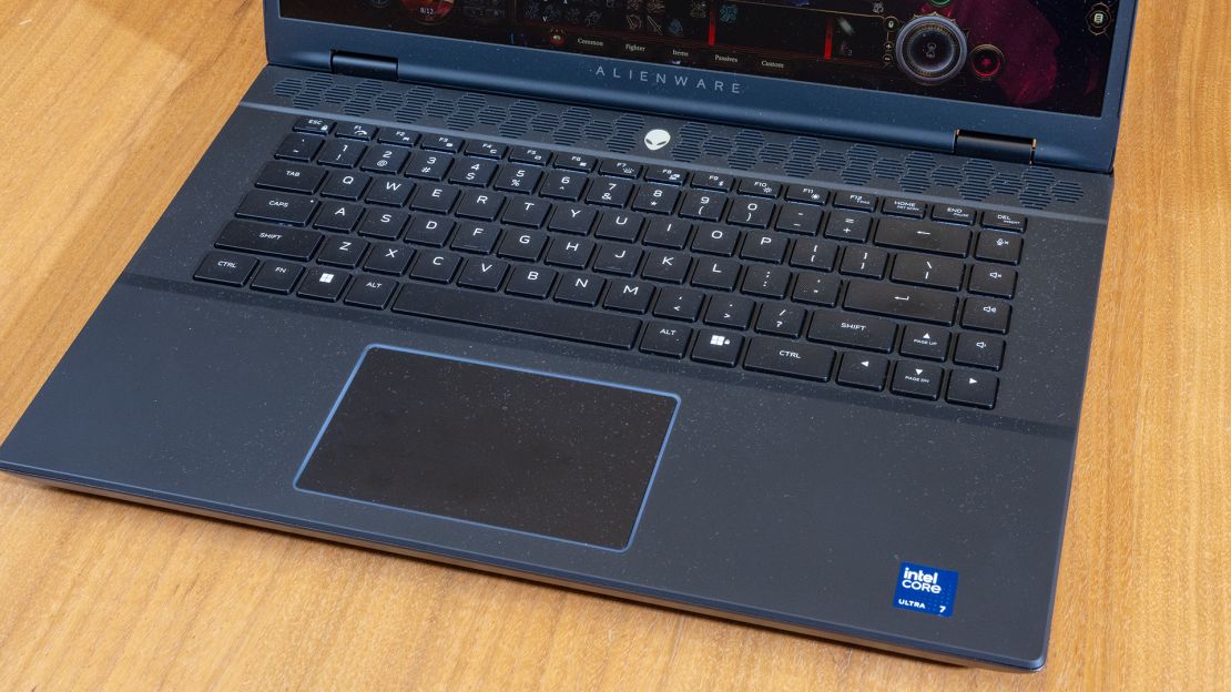 The keyboard deck and touchpad of the Alienware m16 R2.