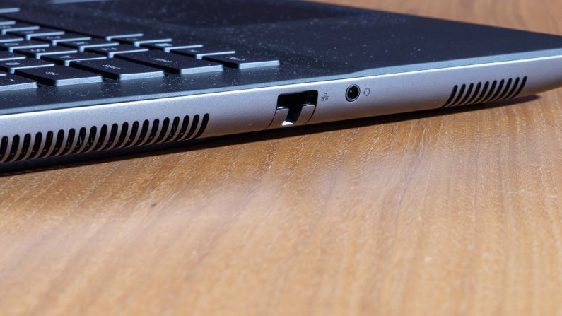 The left side of the Alienware m16 R2 deck with keys and Ethernet and headphone jacks.