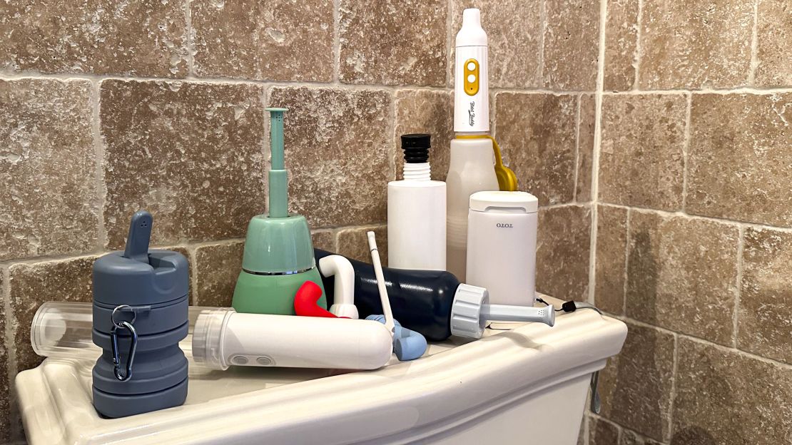 All travel bidets lined up in bathroom