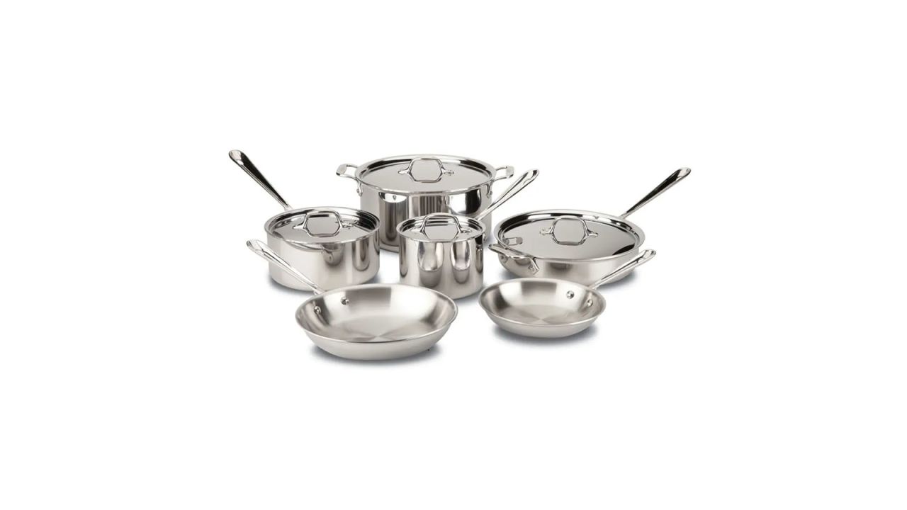 Six pots and pans part of cookware set.
