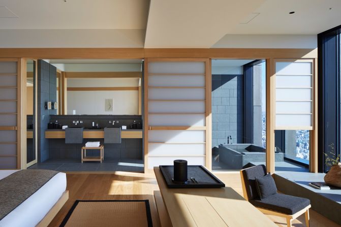 <strong>7. Aman Tokyo:</strong> This design-forward hotel includes traditional Japanese elements like shoji doors and stone onsen baths.