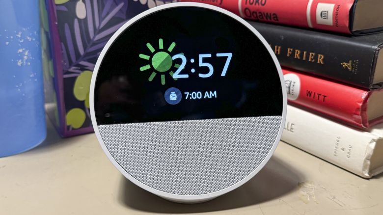 Amazon Echo Show with the time 2:57, a sunny icon and a 7am alarm time