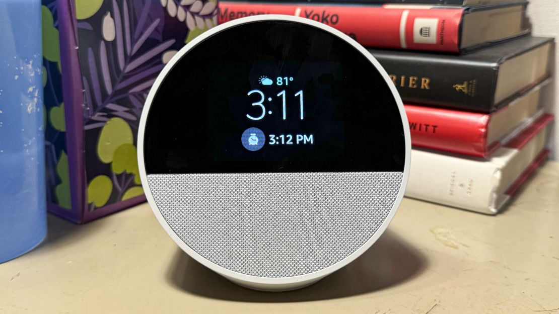 Amazon Echo Spot with the time 3:11, text for an 81-degree partly cloudy day, and a 3:12am alarm time