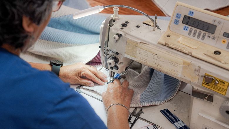 Fabric is sewn at the Faribault Mill factory.