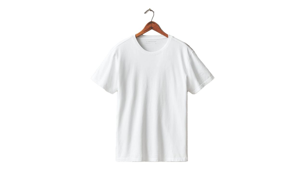 An American Giant white T-shirt on a hanger.