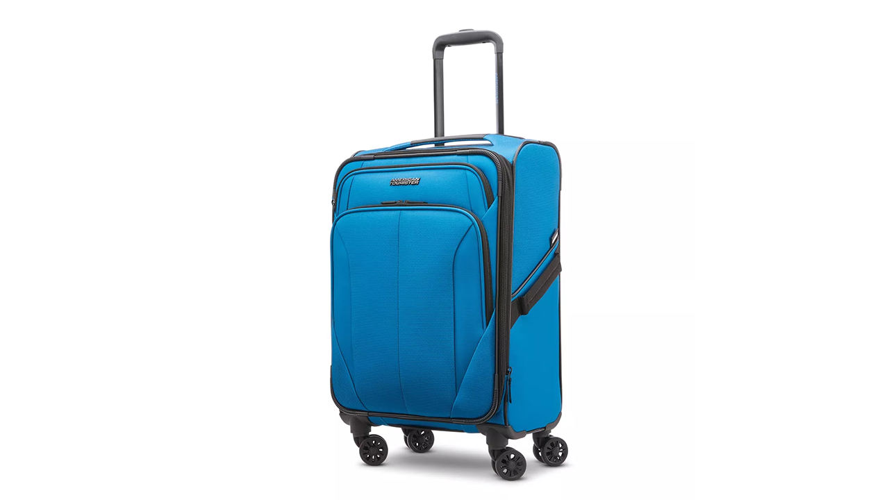 American Tourister Phenom Softside Carry On Spinner Suitcase stock photo