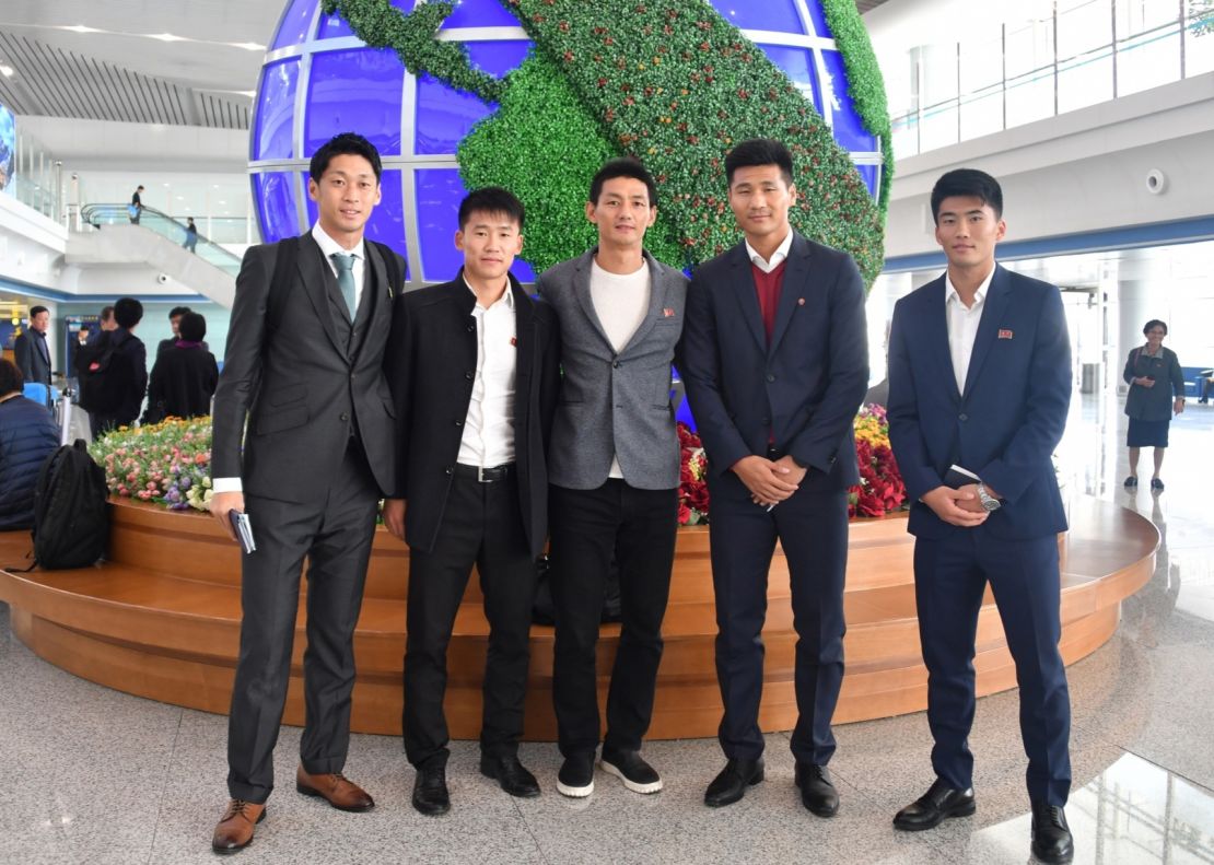 An Yong Hak (in the middle) and Han Kwang Song (far right) in Pyongyang in 2019 with other North Korean soccer players.