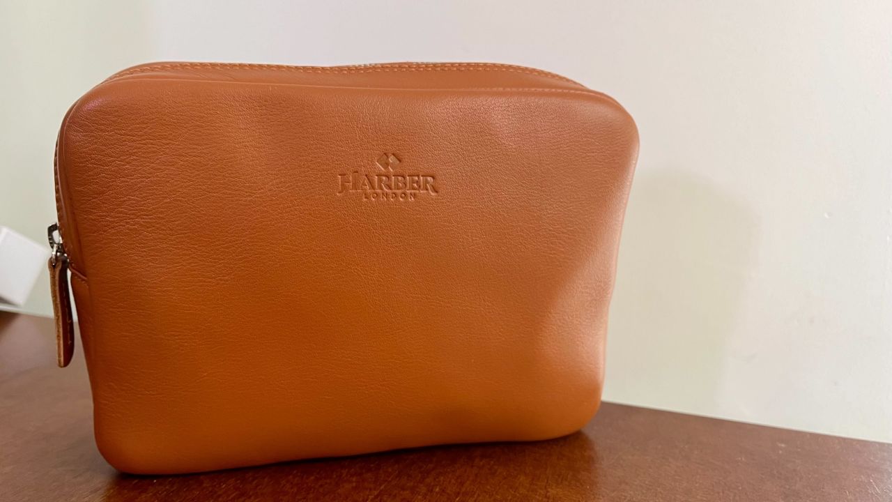 A photo of the Harber London Tech Dopp Kit on a desk