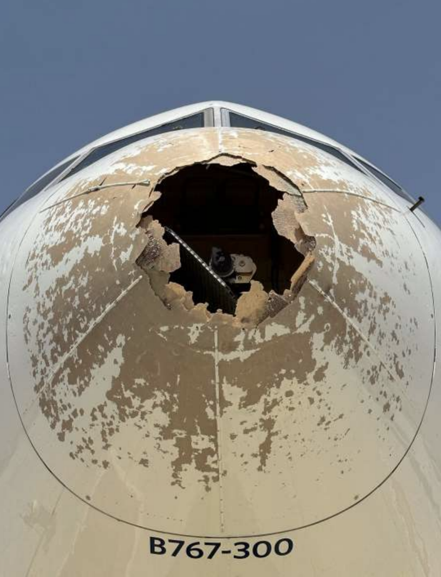 Damage to nose of Delta Air Lines aircraft from flying into hail in 2023, according to Italian accident report.