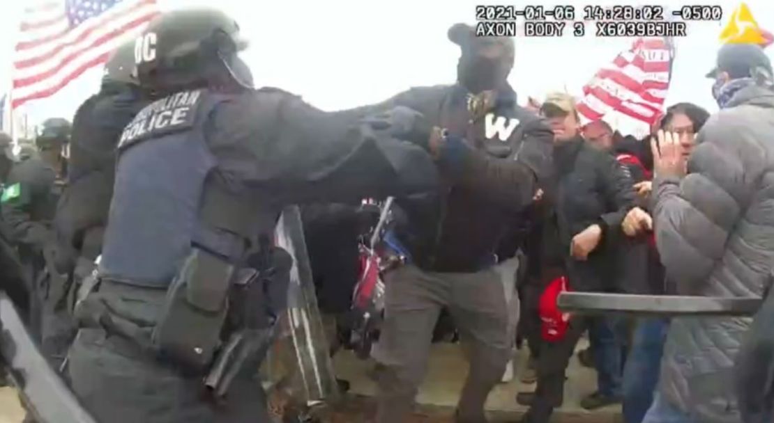 Prosecutors say this image taken from a police body camera video shows Antwione Williams grabbing a Washington, DC, police officer during the Jan. 6, 2001 riot outside the US Capitol.