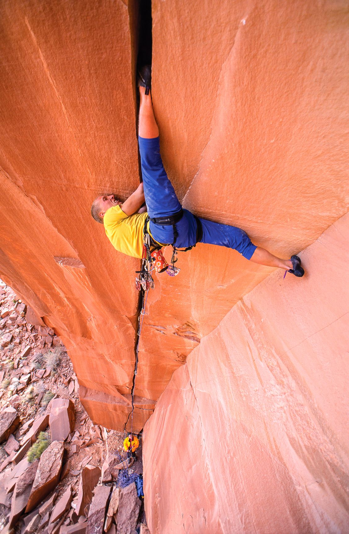 A climber navigates an awkward crack at Utah's Indian Creek.