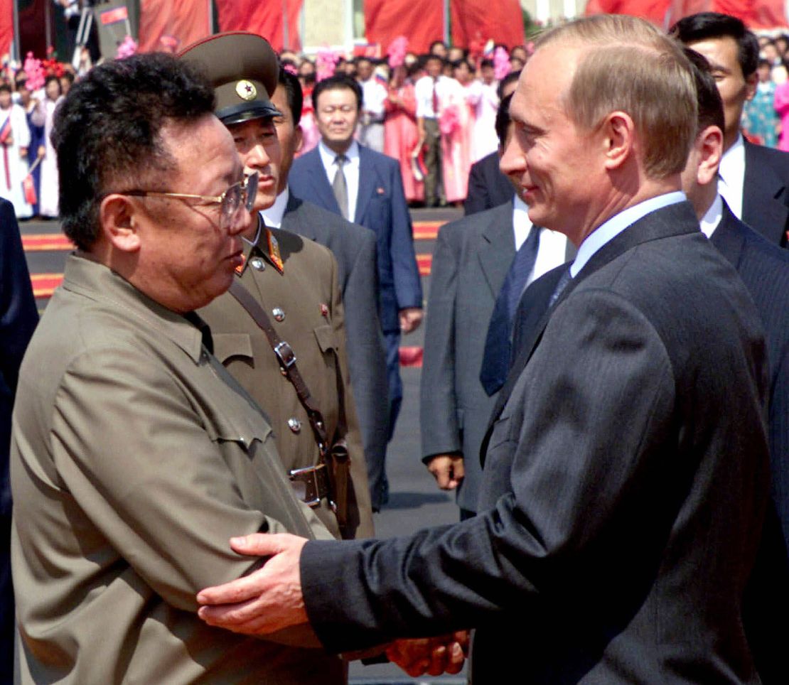 Russian President Vladimir Putin, right shakes hands with North Korean leader Kim Jong Il, on his arrival in Pyongyang, Wednesday, July 19, 2000.