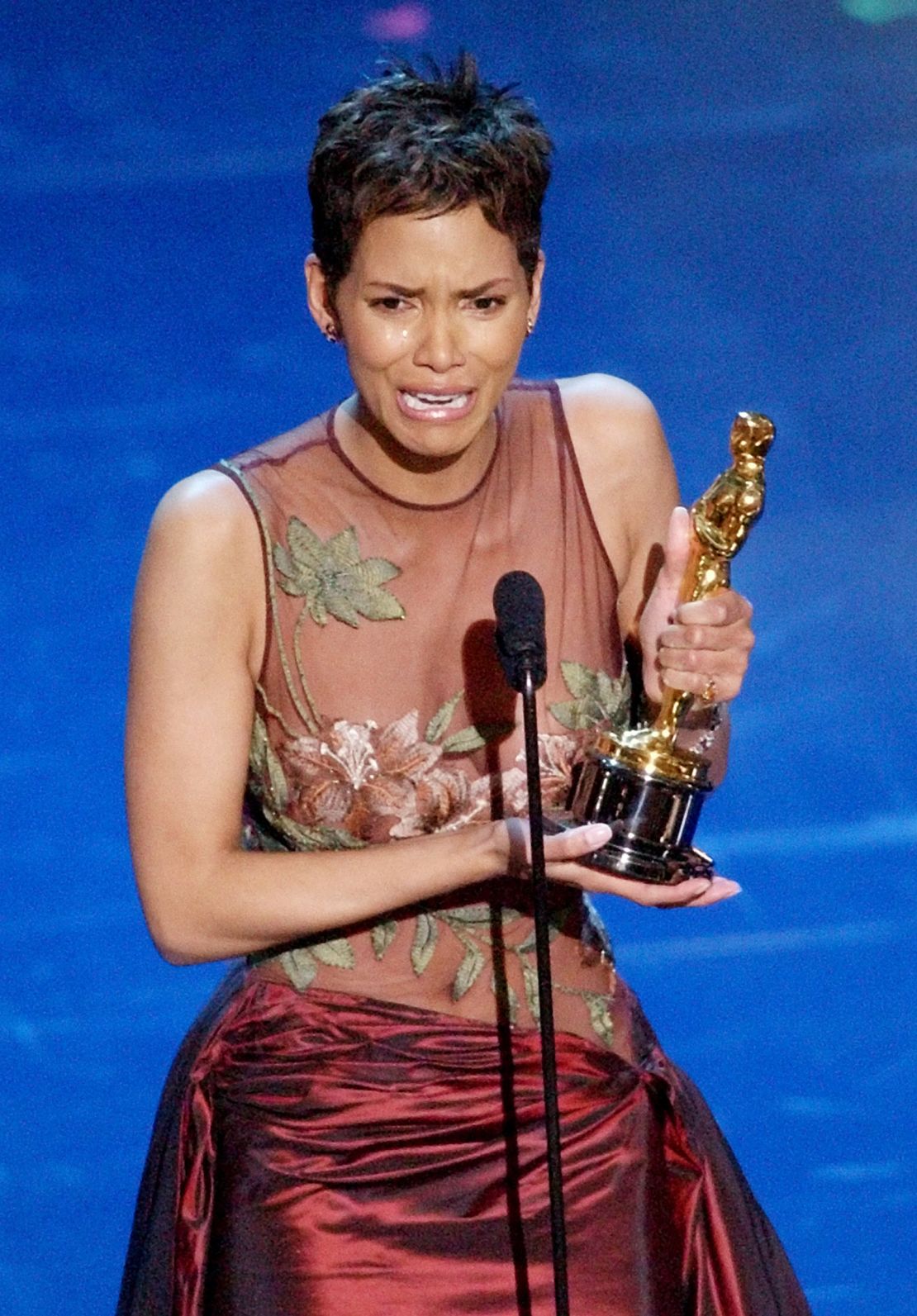 Halle Berry accepts her Oscar for best actress for her role in "Monsters Ball" during the 74th annual Academy Awards in 2002.