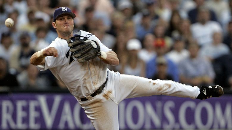 San Diego Padres third baseman Sean Burroughs fires a throw to first from his knees but is unable to get Los Angeles Dodgers batter D. J. Houlton at first during the third inning Wednesday, June 22, 2005, in San Diego.
