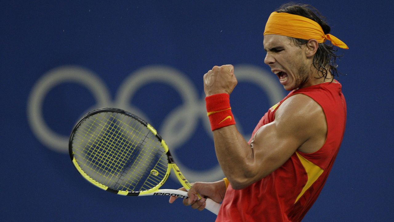 Rafael Nadal of Spain reacts to winning a point against Fernando Gonzalez of Chile during their Gold medal singles tennis match at the Beijing 2008 Olympics in Beijing, Sunday, Aug. 17, 2008. (AP Photo/Elise Amendola)