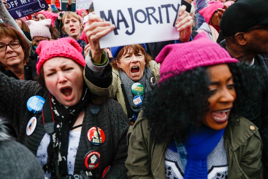 Protesters shout as they participate in the Women's March on Washington on January 21, 2017 in Washington, DC.