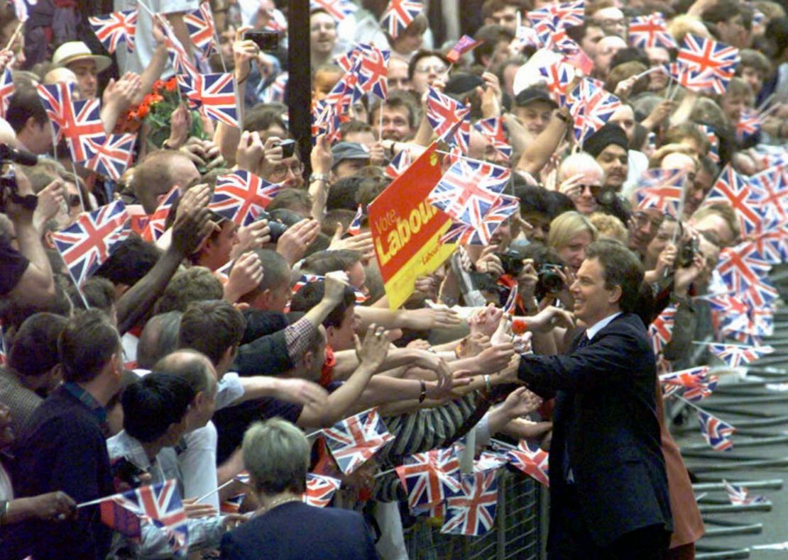 Newly elected British Prime Minister Tony Blair is greeted by a sea of well-wishers in Downing Street, on May 2, 1997. Blair's Labour Party won a landslide victory, ending 18 years of Conservative rule.