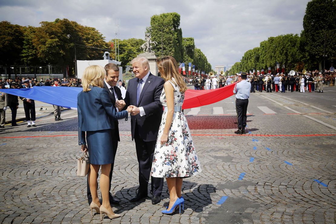 US President Donald Trump and Melania Trump with French President Emmanuel Macron and Brigitte Macron during Bastille Day parade in Paris on Friday, July 14, 2017.