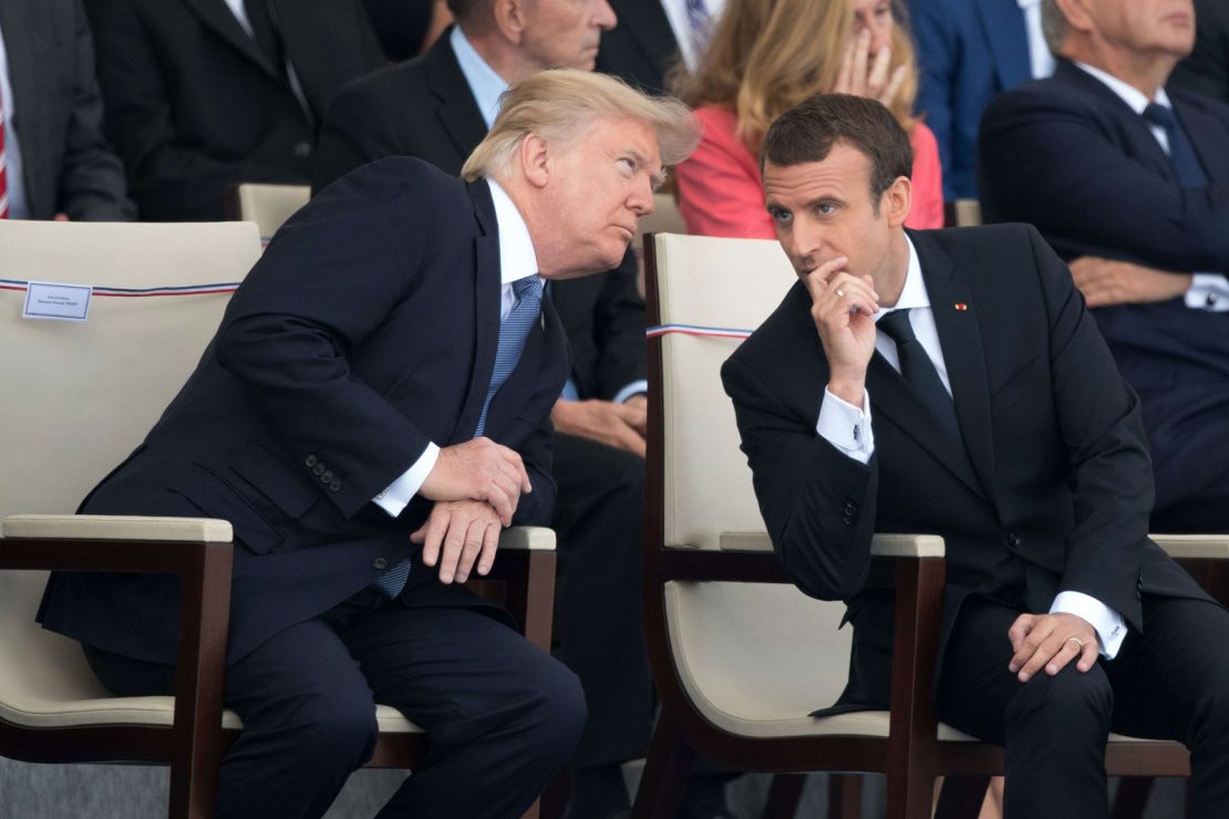 French President Emmanuel Macron and US President Donald Trump attend the traditional Bastille Day military parade on the Champs-Elysees in Paris, France, on July 14, 2017.