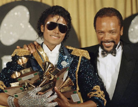 Jones poses for photos with Michael Jackson at the 1984 Grammys.