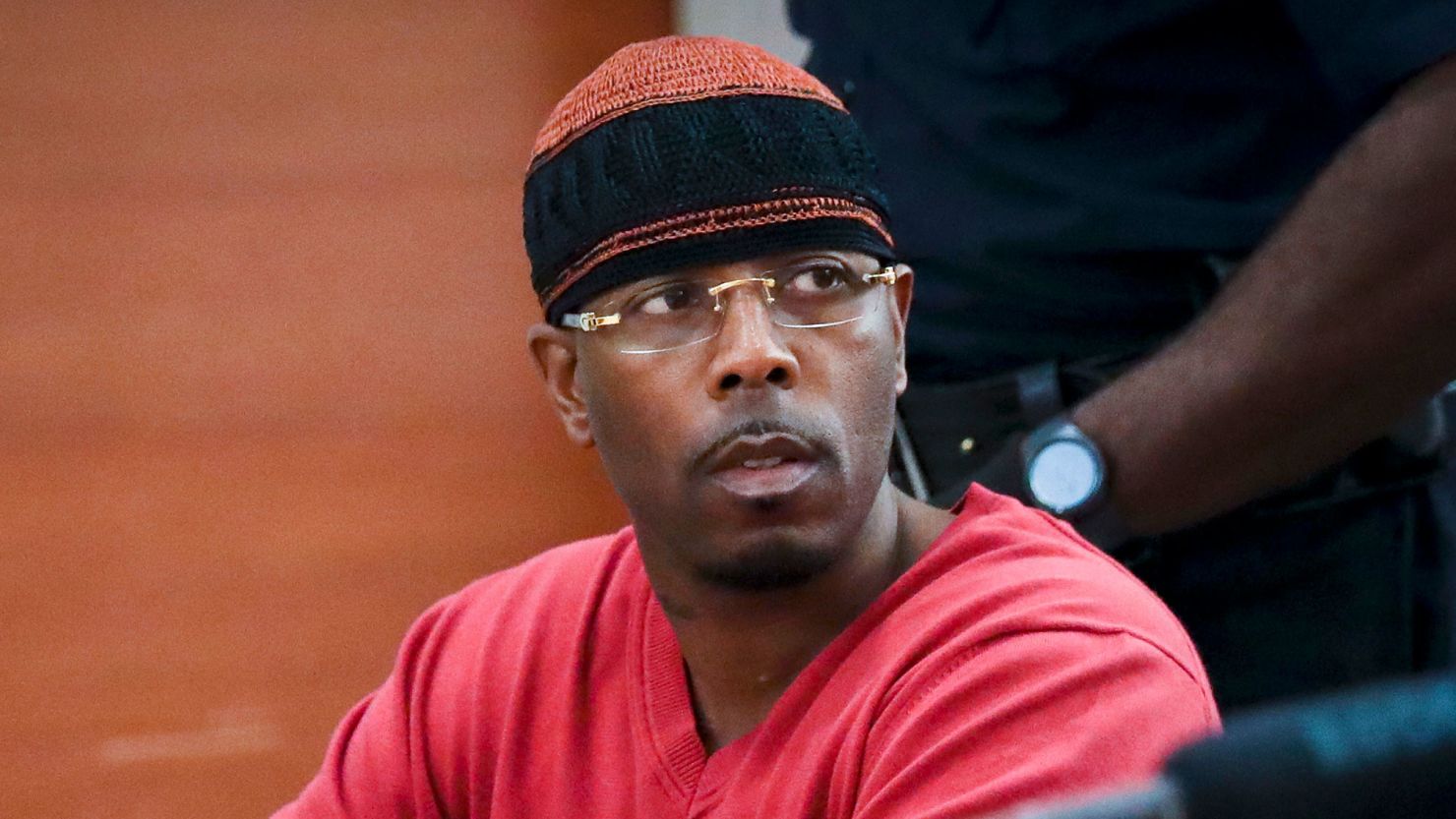 Calvin Buari listens during a May 2017 hearing to vacate his double murder conviction at Bronx Criminal Court. Several days later, he walked out of prison as a free man.